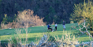 Local kids on their bike on the field Local kids on their bike on the field