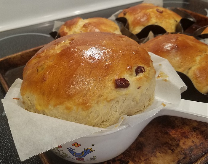Amaretto Panettone this is a round yeast risen dough baked called Panettone with two kinds of raisins in it and flavored with Amaretto,.