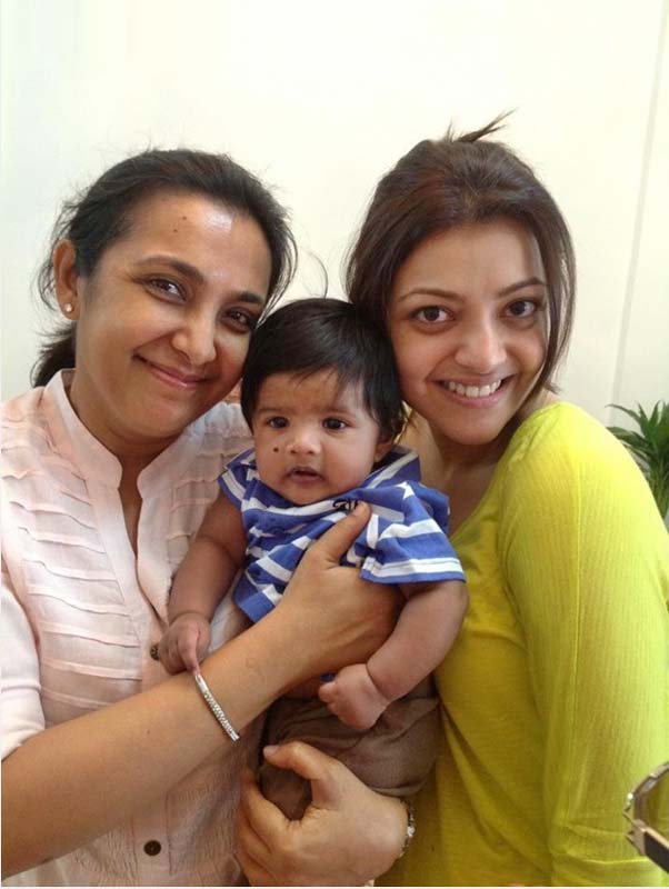 Kajal Aggarwal with kids, Kajal Aggarwal with fan, Kajal Aggarwal cute photos