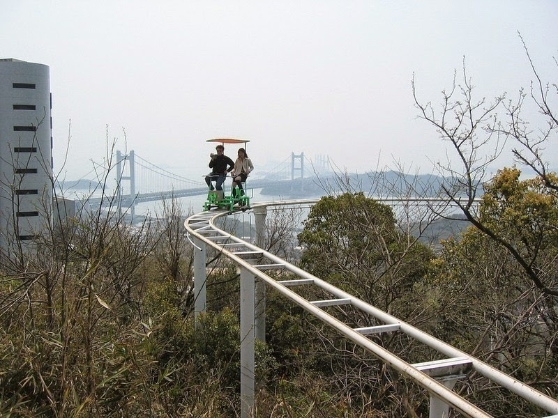 The carts are open air and there are no guard rails. - Japan’s Pedal Powered Roller Coaster Is The Most Unintentionally Terrifying Ride Ever.