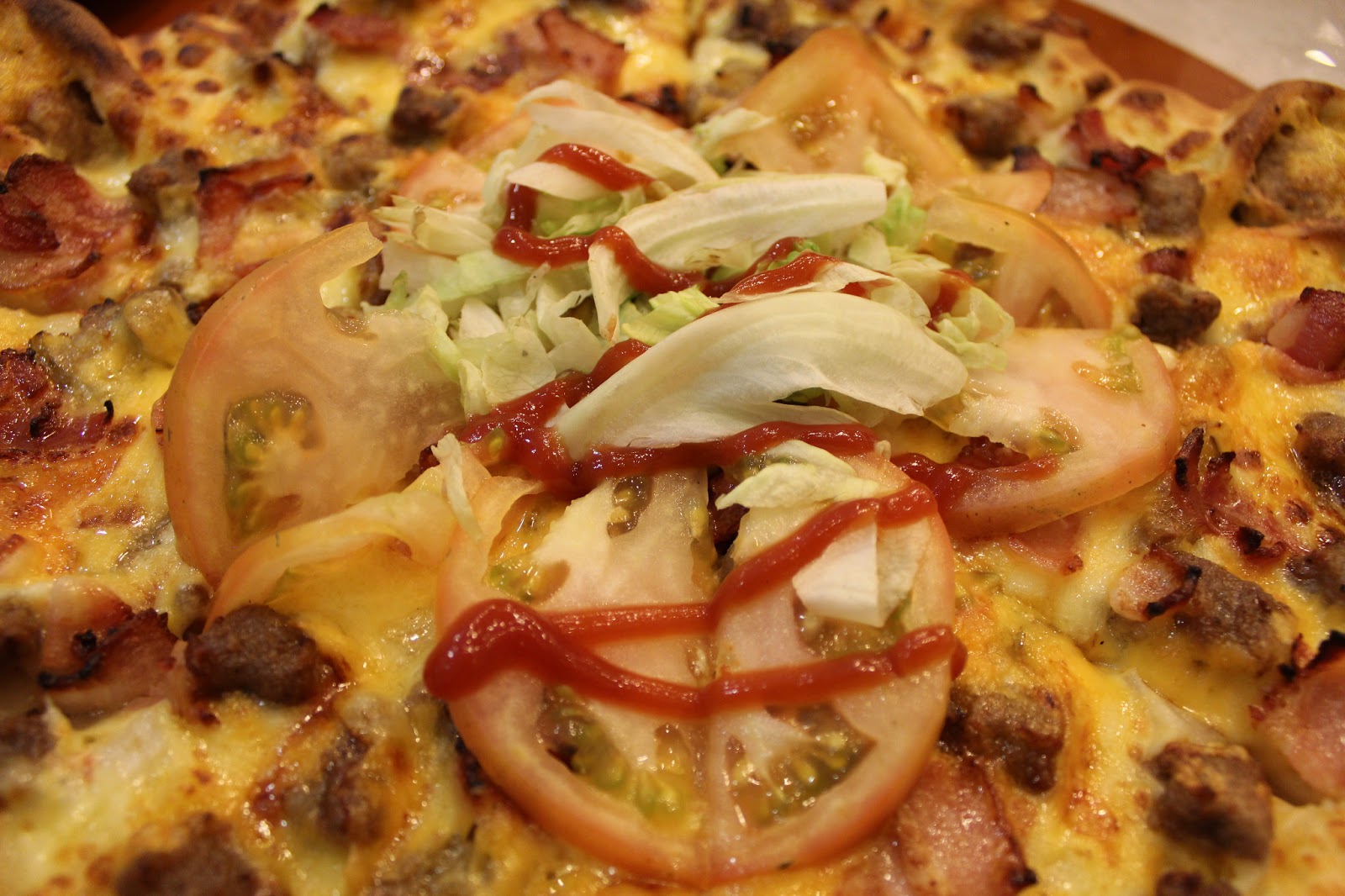 Stay, Stray, Play and Feast Pizza Hut’s Cheeseburger Pizza