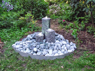 beleuchteter Brunnen (C) by Joachim F. Wenk