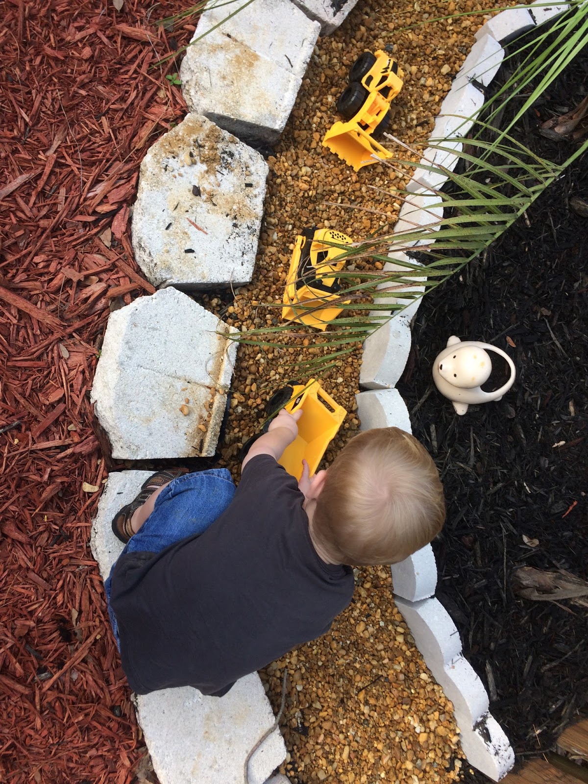 Lean and Green Frugal Living Construction Truck Rock Garden A Sandbox