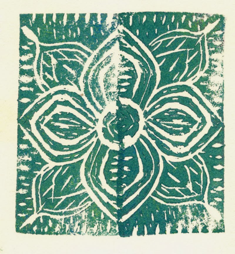 Mirror image stamp of flower