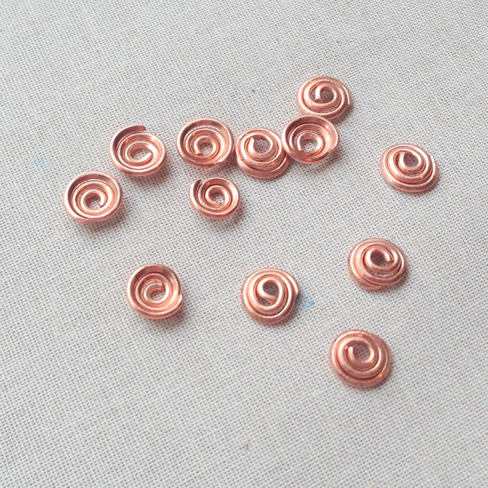 I want to make some of the spiral bead caps! Free tutorial, DIY at Lisa Yang's Jewelry Blog