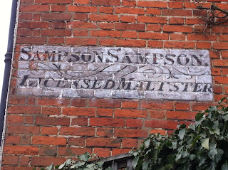 Ghost sign for SimpsonSampson Licensed Maltster, Farnham, Surrey