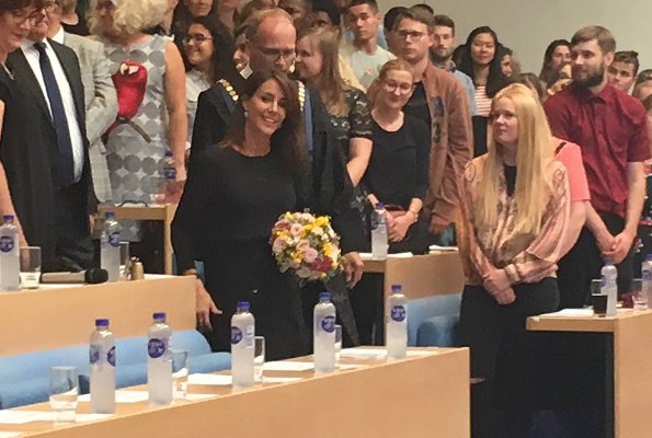 Princess Marie visited SDU in Odense to attend the welcoming ceremony for new international students. is wearing Zara
