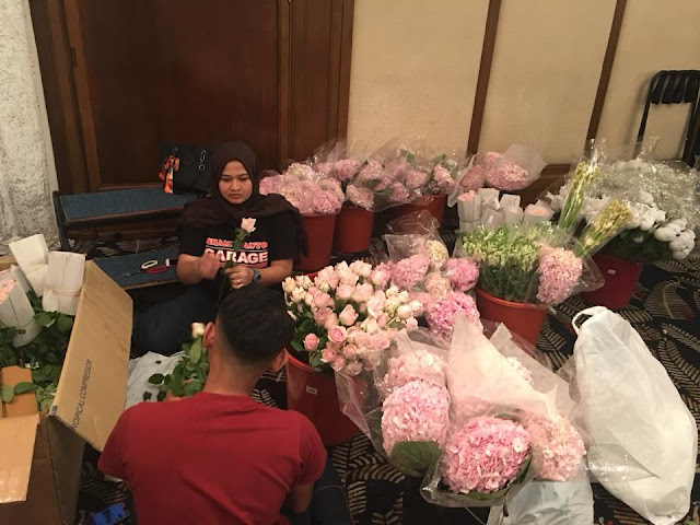 getting flowers ready for wedding