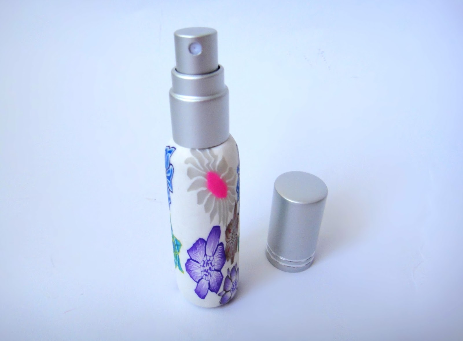 http://www.bornprettystore.com/10ml-floral-portable-perfume-bottle-spray-refillable-bottlerandom-color-p-16039.html