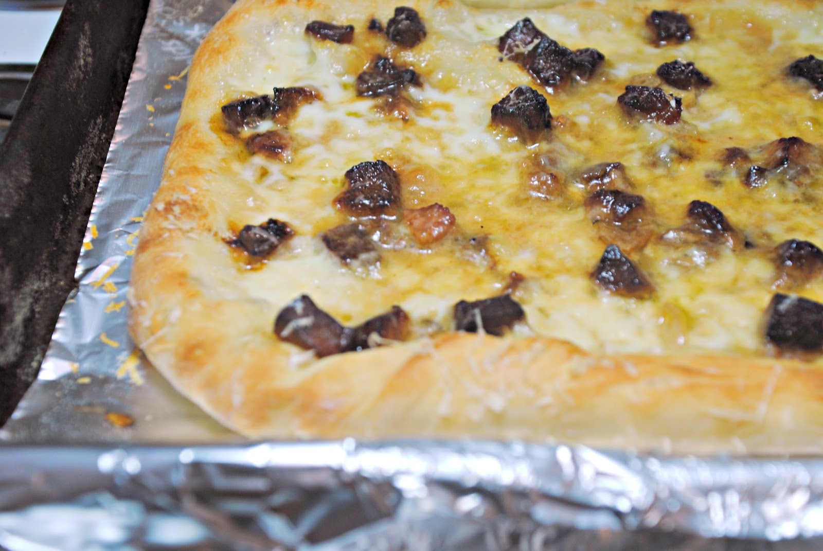 GourmetGents By the Slice (White pizza with pancetta and arugula)