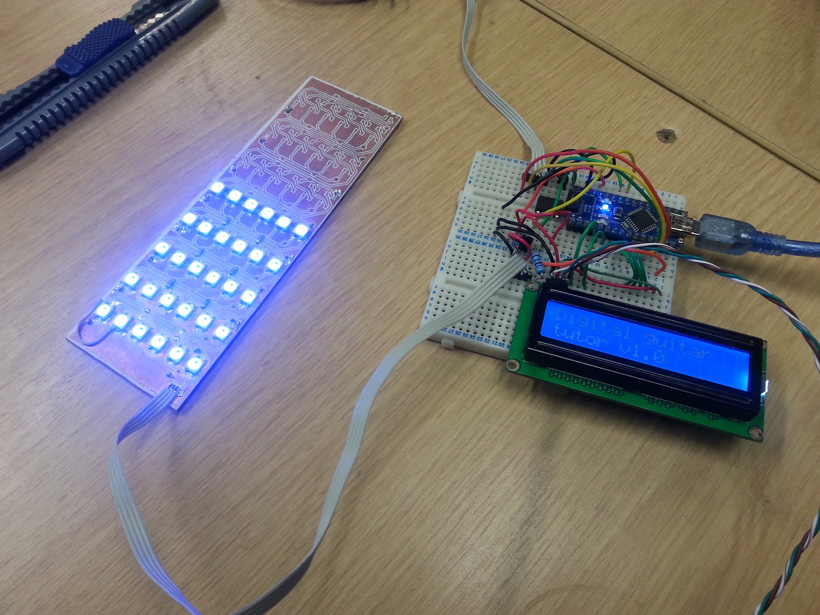 (so far we've only soldered up six out of a possible nine "frets" or columns of LEDs, but enough to prove that the concept works - the circuit design is ...