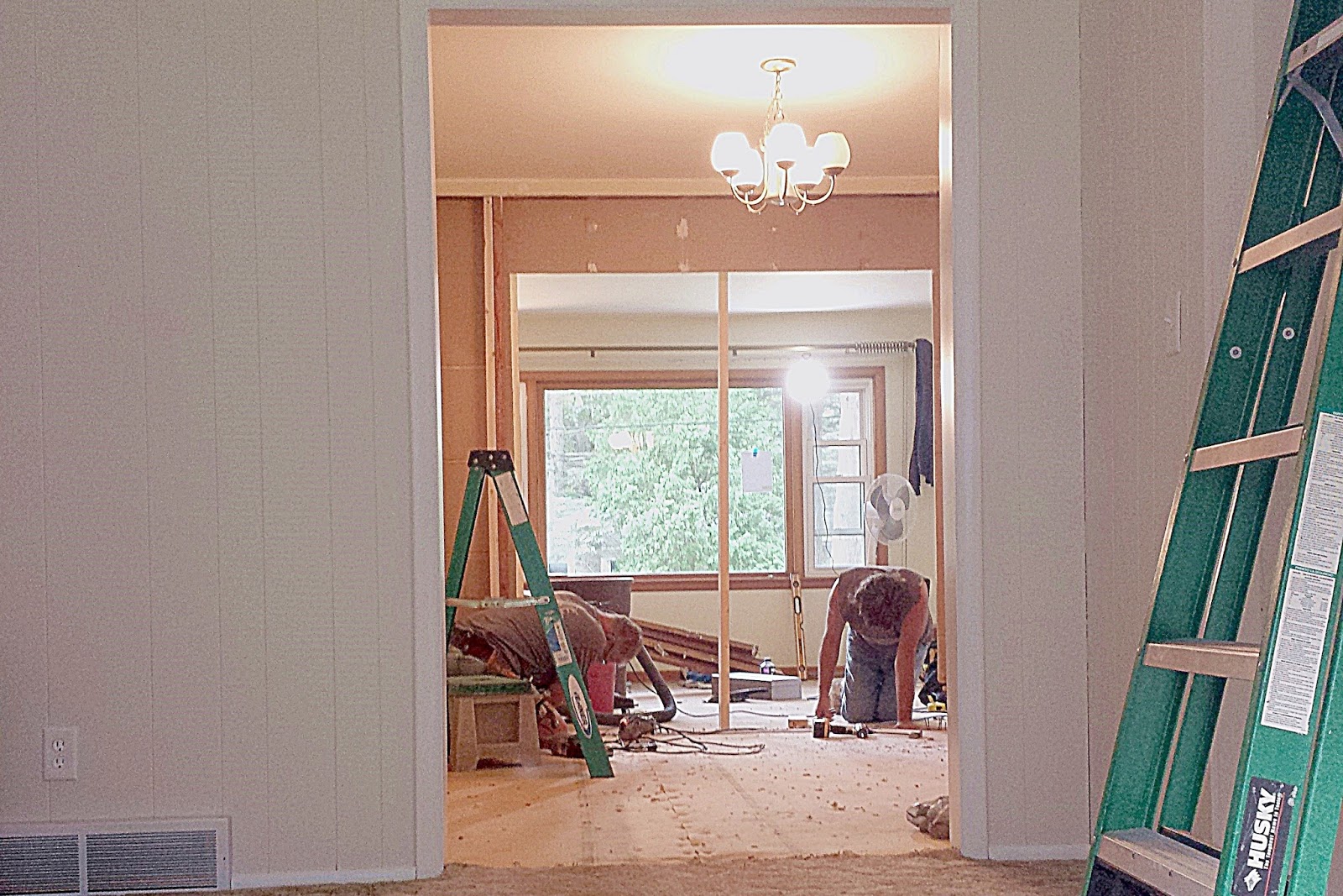 Opening the wall between the dining and living rooms LC Studios