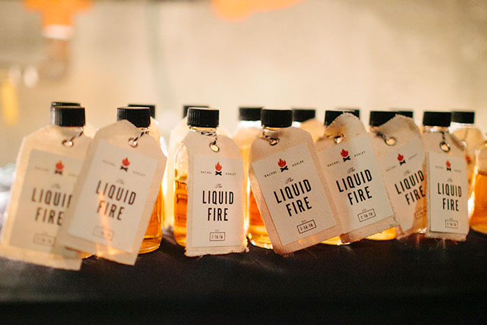 Whiskey travelers with custom favor tags. Photo by Julie Harmsen. Liquid Fire