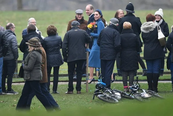 Kate Middleton wore a blue coat by Catherine Walker.LK Bennett dress, Prada pumps, carried Jimmy Choo clutch. Queen Elizabeth