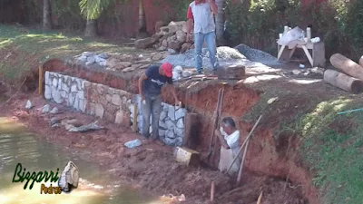 Bizzarri iniciando a execução de um muro de pedra em volta do lago onde vamos fazer em toda a extensão do lago. 1 de março de 2017.