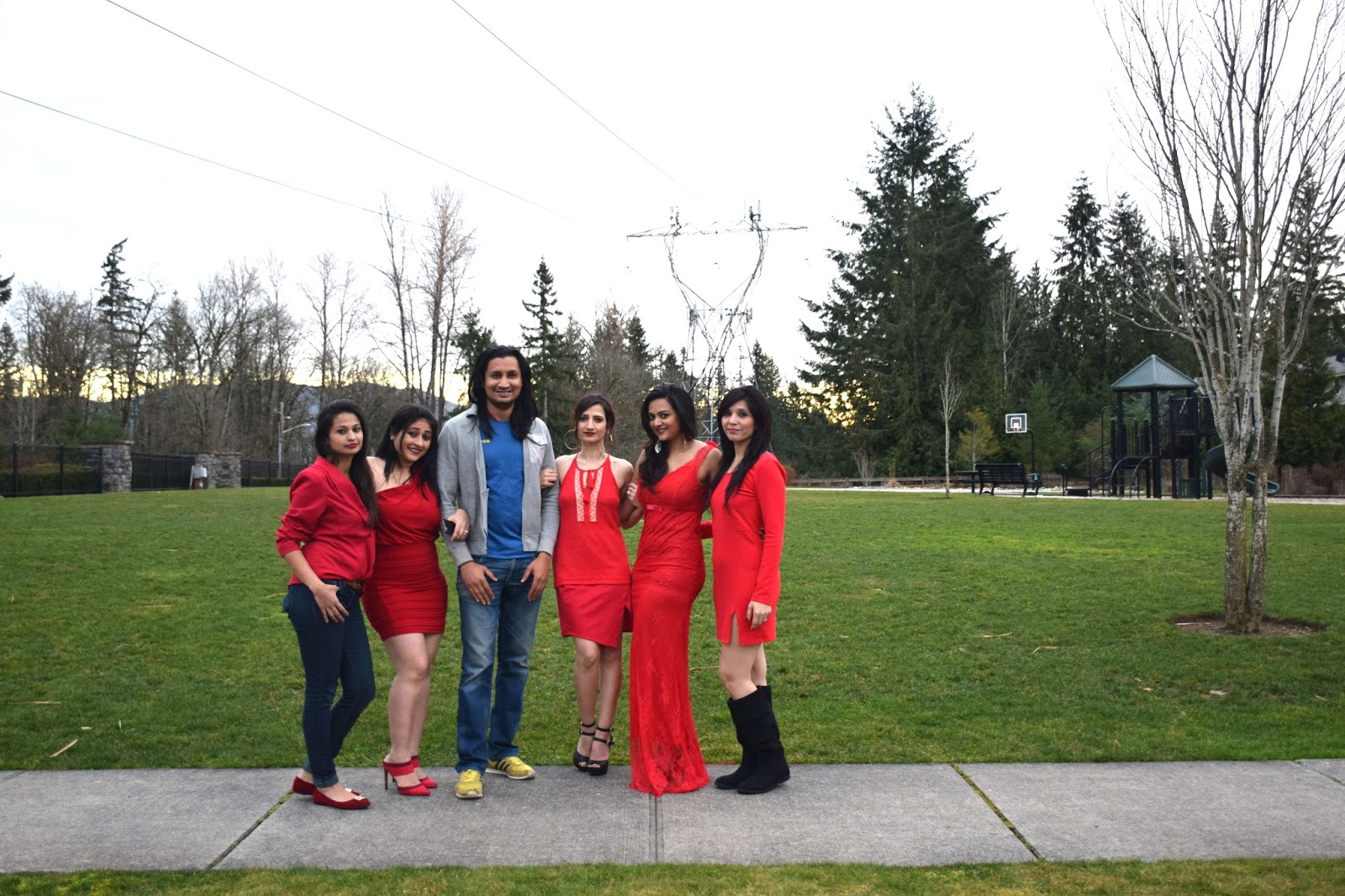 gals all wearing red dress, group pic of indian gals, different types of red dresses, Seattle indian ladies, red lipstick on brown skin  