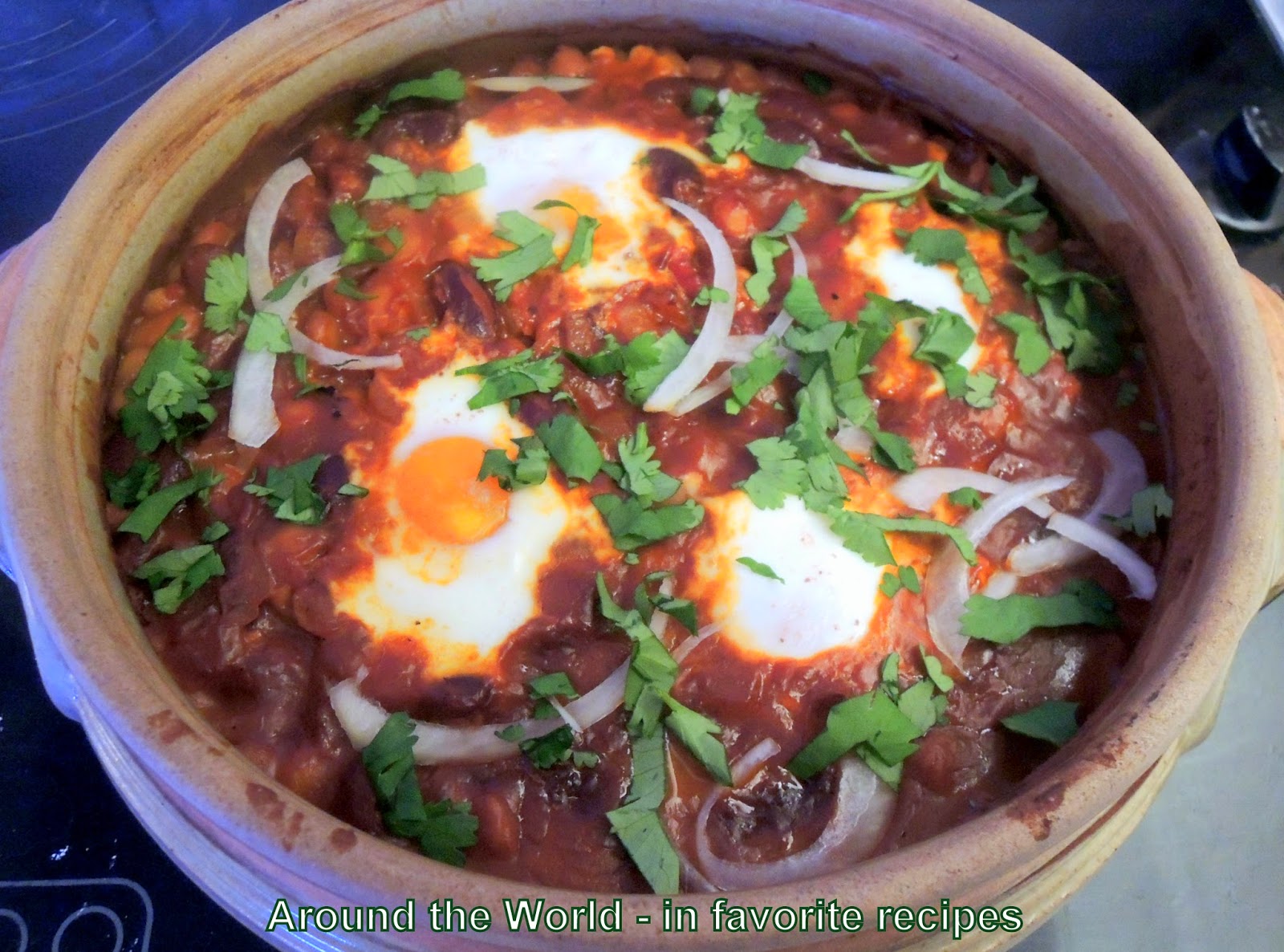 Around the World in favorite recipes Spanish Baked Beans with Eggs