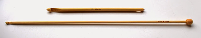 Two bamboo tricot hooks. Top: a double ended crochet hook.  Bottom: a specialist tricot hook.