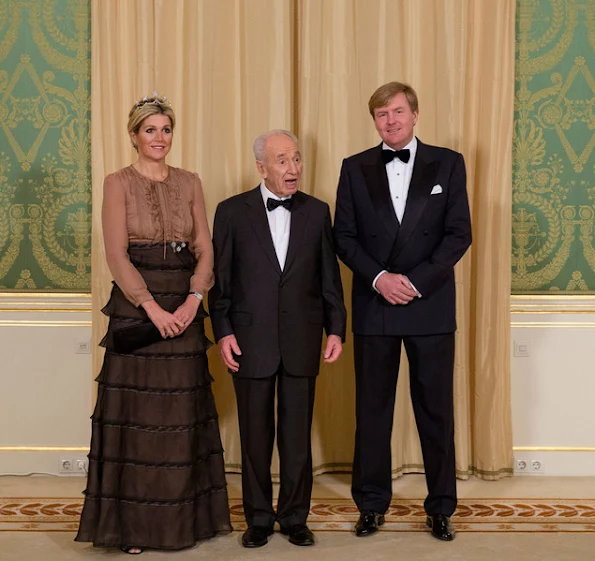 Queen Maxima's dress from Valentino.We have seen the same dress Crown Princess Marie Chantal and Crown Princess Mette Marit too
