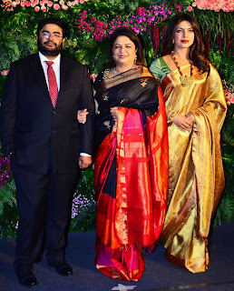 Priyanka CHopra in Saree with family at Viruskhas Reception