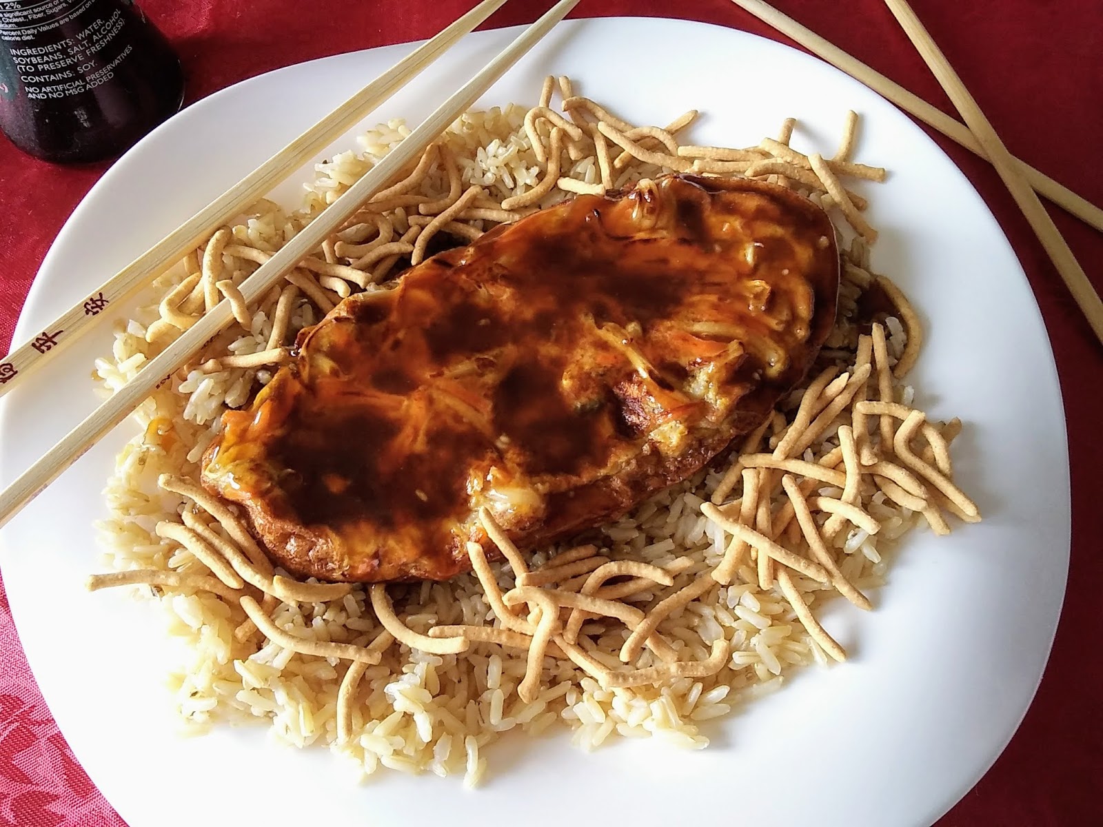 Warm up the sauce, if needed, and pour over the Egg Foo Young patties.