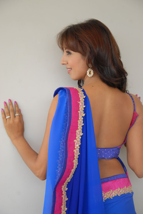 sanjana bare back in saree actress pics