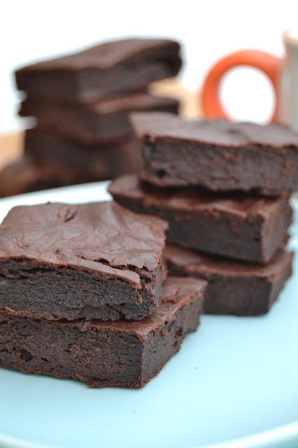 Chocolate brownies made with olive oil and sweetened with strawberry puree