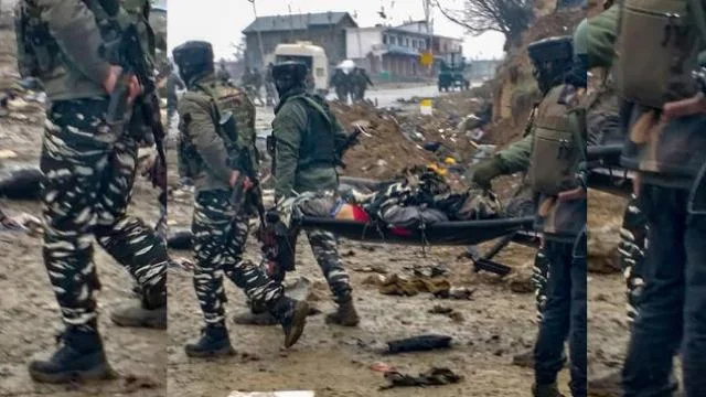 Image Attribute: The site of the Pulwama attack resembled a war zone with body parts and vehicle debris is strewn about / Date: February 14, 2019. / Source: Reuters