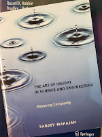 The Art of Insight in Science and Engineering, by Sanjoy Mahajan, superimposed on Intermediate Physics for Medicine and Biology.