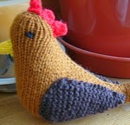 http://www.ravelry.com/patterns/library/knitted-rooster-and-other-birds