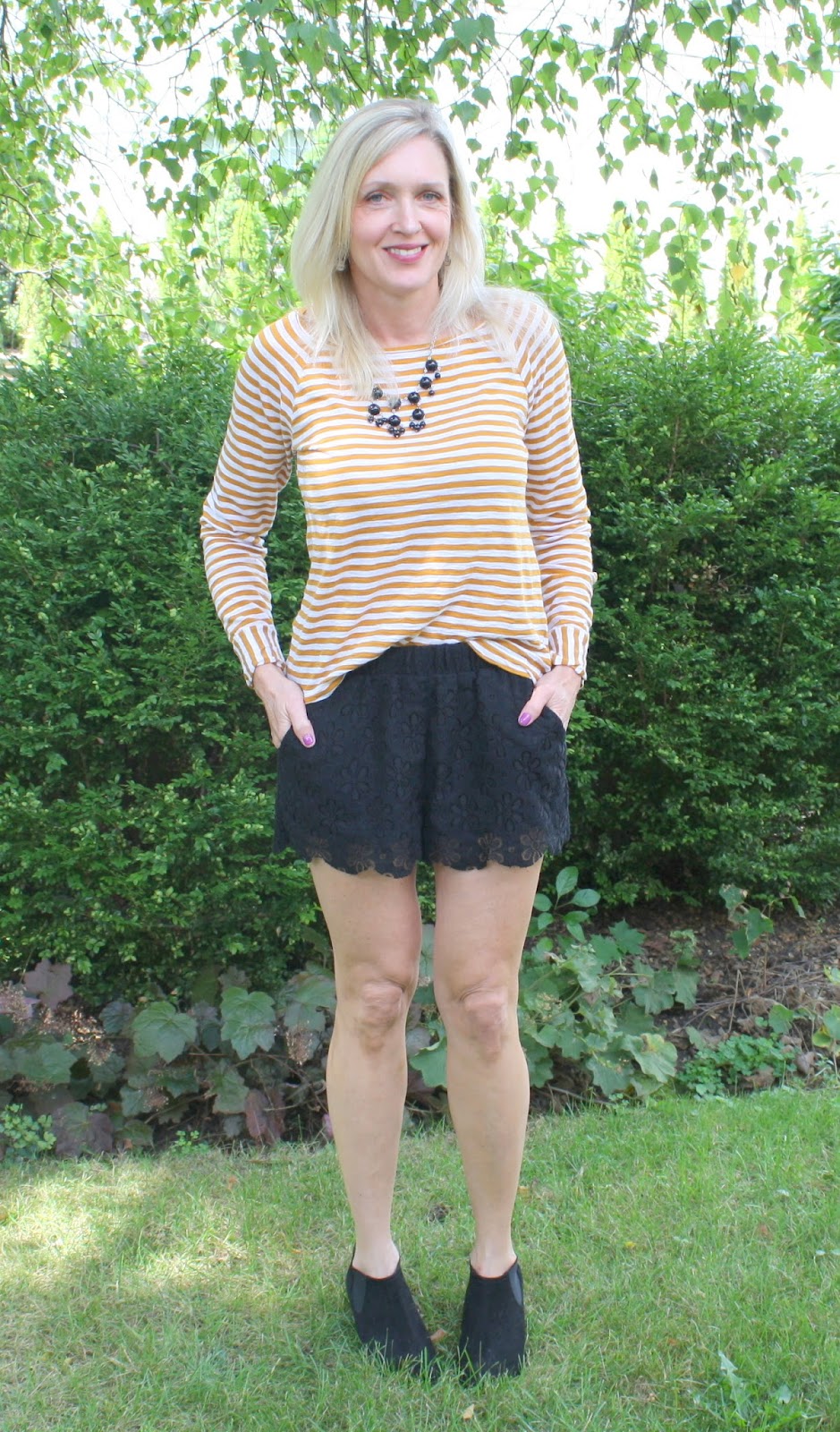 Amber stripes, black lace shorts and booties