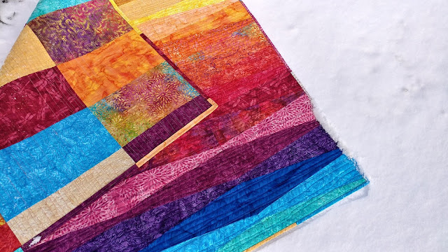 Sunset quilt made with Island Batik fabrics and Aurifil thread