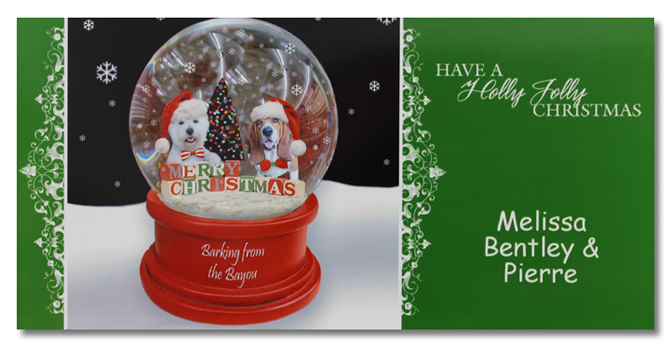 Christmas card with two dogs inside a snowglobe
