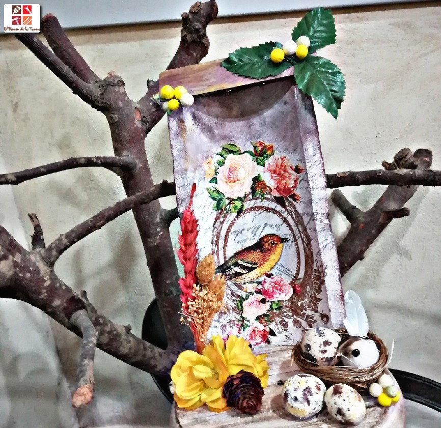 casita de pájaros en una teja