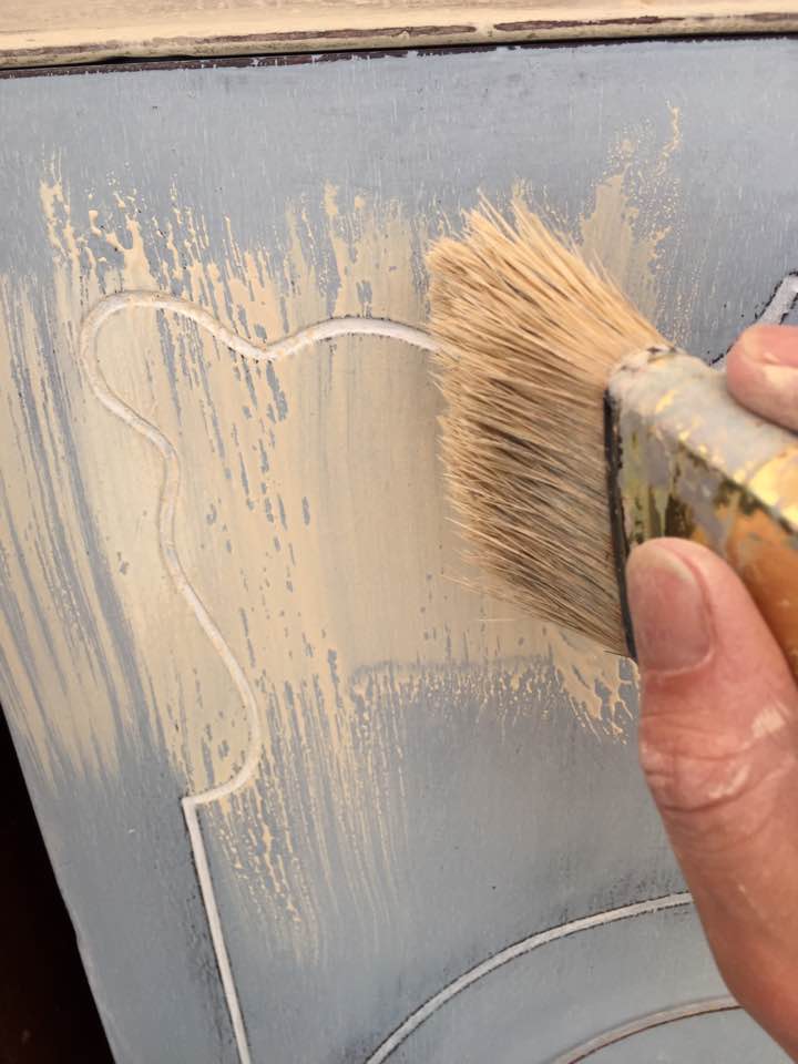 Applying paint wash. Applying paint wash.