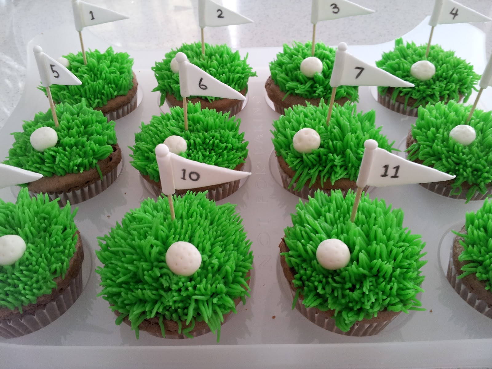 Four!!! Golf Themed Cupcake.
