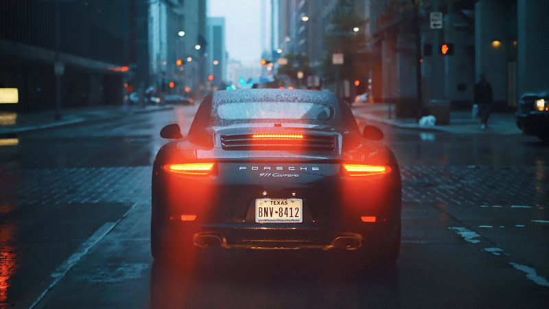 Porsche 911 Carrera on Rainy Streets