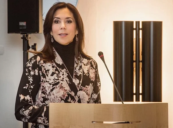 Responsibility and bottom line: Gender equality and women's health for businesses and investors. Crown Princess wore a floral print v-neck blouse