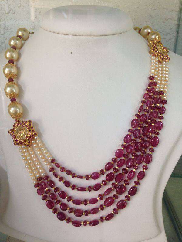 Jewellery Designs : #@ Pearls and Rubies Step chain with Gold flower