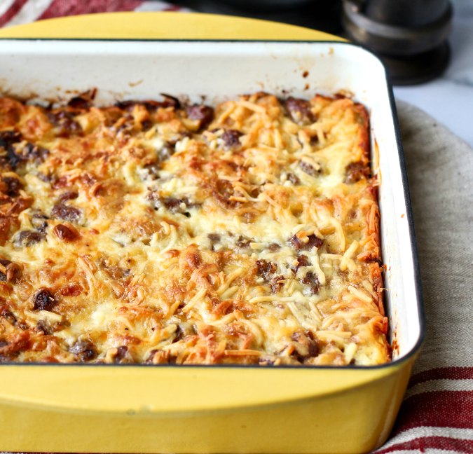 Waffle Casserole with eggs, cheese, and Maple Sausage #breakfastcasserole #waffles