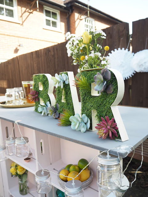 DIY tutorial for an outdoor bar using wooden crates, plus artificial grass bar letters to decorate. Perfect for summer BBQ's or garden parties. 