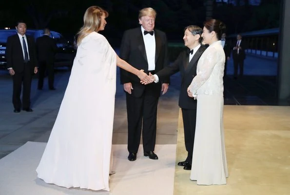 Empress Masako and first lady Melania Trump both wore light dresses. Crown Prince Fumihito, Crown Princess Kiko