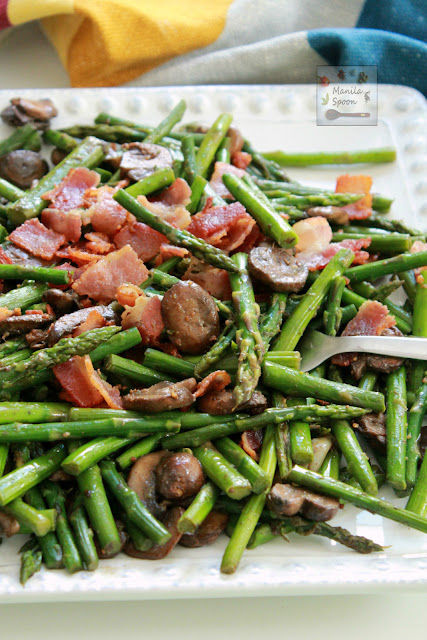 This quick and easy Asparagus dish is loaded with flavor from bacon and mushrooms! Done in 15 minutes or less. Totally gluten-free and low-carb, too.