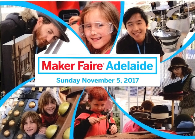 Coloured photo postcard: Centre white box of text surrounded by 6 photos of Maker Faire activities. Each photo is separated by a blue band.  Text: Maker Faire Adelaide Sunday November 5, 2017. Photos: (top left) a man with a brimmed hat, dark jacket and red-brown beard examines a model of miniature scenery; (top centre) A child 's smiling face wearing clear safety glasses; (top right) a man with black hair and black shirt smiling next to a piece of silver and white technology which could be a robot; (bottom left) faces of two smiling children between two daleks; (bottom centre) a young child with red hair and red/black top is hammering a nail; (bottom right) a woman with black hair, wearing a brown brimmed cloche-style hat and patterned vestis looking at a millinery exhibit. Hats are on the countertop and on raised stands.