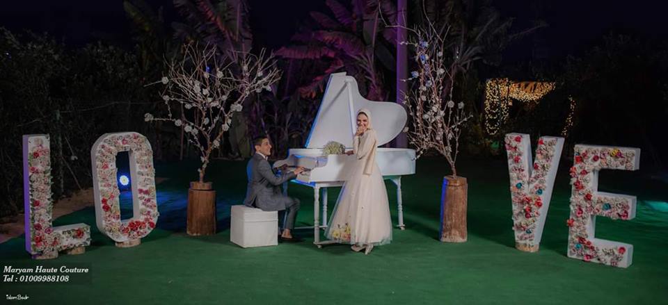 فساتين سواريه مزينة بالورود لإطلالة مفعمة بالحيوية فساتين,فساتين سواريه,فساتين بالورد,فساتين مزينة بالورد,فساتين محجبات