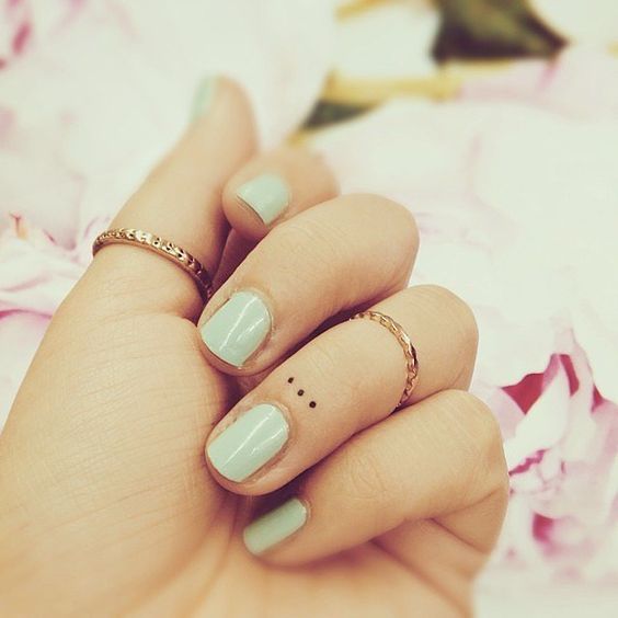 16 Cool Symbolic Tattoos & Meanings Small Symbolic Tattoos on Finger