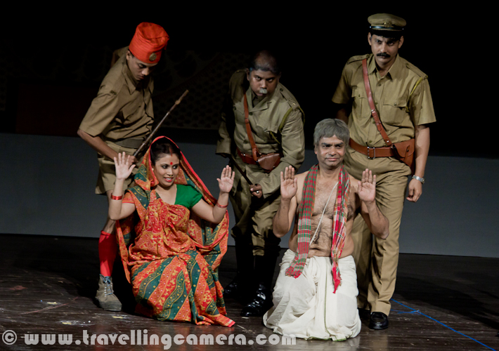 Byomkesh play was performed at 14th Bharat rang Mahotsav 2012. It was one of the exciting plays of Bharangam 2012. It was performed in Kamani and whole auditorium was full of audience from various parts of the country. Let's have a quick Photo Journey of Byomtesh, a Bengali play with English subtitles...Inspired by the fictitious character of Sherlock Holmes, Byomkesh Bakshi was created as the intelligent, mystery-loving and mystery-solving detective of Bengali literature. And most of the folks also relate to Byomtesh as one of the popular Indian Detective, who was seen many times on Doordarshan-1. This is one of the TV-Serials, our generation has seen on DD-1. During childhood Byomkesh was one of the hero and now if we see some of the episodes, it looks like a comedy serial. This play was on same lines, but there were few things which were seriously taken care of.Play starts with a phone call to Byokesh that an old man of a family has been found dead with some odd things happening in the family. At the same time police has started the investigations around the case. There was a very common thing in all Byomkesh episodes on Doordarshan and Police used to give some non-sense reasoning. And Byomkesh always used to think differently. Same thing happened in this play as well. police Inspector was interesting and delivered some of the humorous dialogs brilliantly. There were some flash-back scenes in this play. Above scene was shown when Police Inspector was asking questions from home servant in that house. He is in flash-back and thinking of conversation between him and his Boss, who is not alive now.Similar to Holmes who had his companion in Watson, Byomkesh also cultivates the friendship of Ajit Bandhopadhyay who is his perennial fellow adventurer on his quest to solve mysteries and murders. Holmes and Byomkesh had one major difference - the former was disinterested in women and stayed a bachelor, while Byomkesh meets his life-partner Satyabati and eventually marries her. See the photograph below, which is a conversation about investigations but expressions of Byomkesh can interpreted in two ways...Here Byomkesh is interrogating one of the lady in house and she has few things missing from her room. Initially she was very comfortable and denied of any change in her room. But later it came out that a needle was missing from her room, which was found near Dead-body. Let me stop here as I am not supposed to share exact story here.One of the family-member was fond of Sitar and most of the times he can be found on it. He was handicapped and looked someone who is more into reading, music & happy to be alone.After all interrogation sessions with different Family Members and more information from outside sources, Byomkesh reaches to final culprit and he accepts his fault. Above photograph shows the scene when Byomkesh is explaining everything about the case.Finally Byomkesh also fallen in love with the girl from same house and here is a photograph clicked during end of the play.Here are some of the Theatre Performers in Bengali Play BYOMKESH, during 14th Bharat Rang Mahotsav 2012. They are with one of the typical action/posture/style, which they portrayed in this play.The play Byomkesh presents the life and times of one of the greatest fictitious character of crime thrillers. It unveils the mysteries, intricacies and compulsions, motives and hidden agendas of human relationships and simultaneously throws light on the baser instincts as well as the higher aspirations and values of human beings.Bratya Basu standing on Kamani Stage with his crew of Byomkesh after successful completion of the performance during 14th Bharat Rang Mahotsav 2012.This play was in Bangla and English subtitles were being shown on top of the stage. At times, Bangla dialogs were so fast that it was extremely difficult to read the dialogs written in English. Since there were lot of Bengali folks in the ground to help us in making sure that we laugh when required :) ... Anyway, play was full of laughter with interesting punches in between.Emmanuel Singh and Rajni from National School of Drama, who are facilitating post play ceremony of presenting flowers and momento of 14th Bharat Rang Mahotsav to Director and Team of Byomkesh play.Subhrajit Dutta, who is standing in the middle, played the role of Byomkesh Bakshi in this play. Some of the more details about this role in Bratya Basu's Byomkesh, check out http://articles.timesofindia.indiatimes.com/2011-02-22/news-interviews/28625059_1_byomkesh-bakshi-stage-roleHere was a quick PHOTO JOURNEY from Byomkesh play during 14th Bharat Rang Mahotsav 2012 at Kamani Auditorium. This festival is being organized by National School of Drama, Delhi with support from Minitry of Culture. 22nd, which means today is last day of this festival and I will eagerly be waiting for NSD Repretory's Summer Theatre Festival 2012.