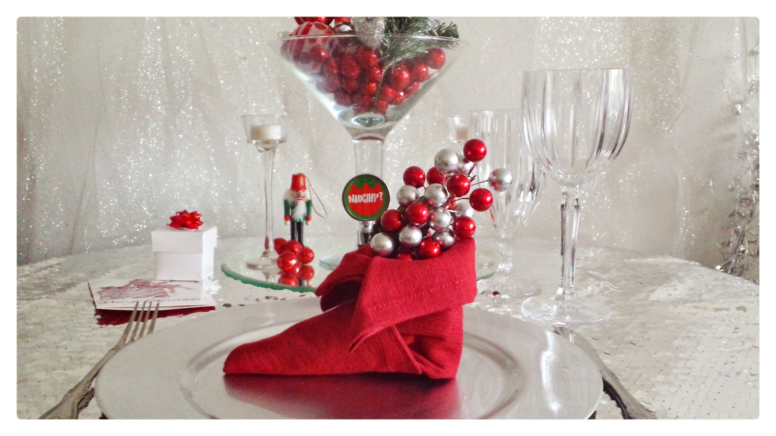 Elegant Festive Christmas Tablescape christmas table design for family party with gift box and naughty sign