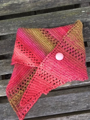 Pink, coral, and gold shawlette
