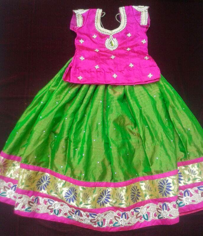 Sravya S Boutique Green Pattulanga With Contrast Pink Color Blouse Green Pattulanga With Contrast Pink Color Blouse